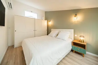 Un ou plusieurs lits dans un hébergement de l'établissement Beautiful two bedroom duplex apartment