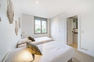 Un ou plusieurs lits dans un hébergement de l'établissement Superbe appartement 5 pièces sur la Croisette