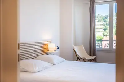 Un ou plusieurs lits dans un hébergement de l'établissement Superb two-bedroom near the Croisette