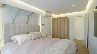 Un ou plusieurs lits dans un hébergement de l'établissement Le Bristol 4 pièces luxe au centre de Juan les pins