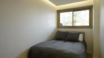 Un ou plusieurs lits dans un hébergement de l'établissement Le Bristol 4 pièces luxe au centre de Juan les pins