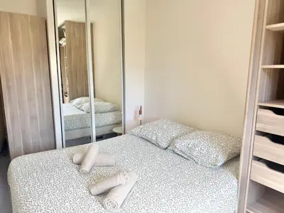 Un ou plusieurs lits dans un hébergement de l'établissement T2 - piscine - garage privé - 5 min de Cannes