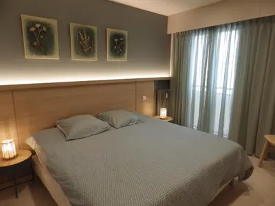 Un ou plusieurs lits dans un hébergement de l'établissement Appartement Rottaro luxueux 2 ch 2 sdb face à la mer