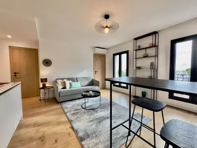 Coin salon dans l'établissement Moderne - Lumineux - Vue Port Antibes