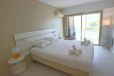 Un ou plusieurs lits dans un hébergement de l'établissement Apartment Seaside