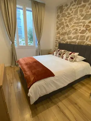 Un ou plusieurs lits dans un hébergement de l'établissement Peaceful City Centre Apartment