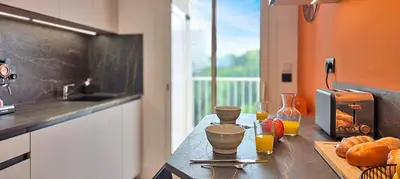 Cuisine ou kitchenette dans l'établissement LX175 Vue mer - Terrasse - Parking - Domaine Privé