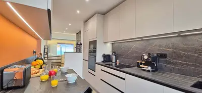Cuisine ou kitchenette dans l'établissement LX175 Vue mer - Terrasse - Parking - Domaine Privé