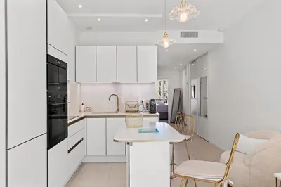 Cuisine ou kitchenette dans l'établissement 3 pièces Juan les Pins Cosy et Luxueux