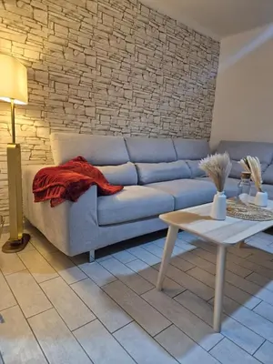 Coin salon dans l'établissement Le Juanéa