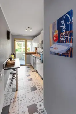 Cuisine ou kitchenette dans l'établissement La Plage - Spacieux - Vue Mer - Parking - Clim - Piscine
