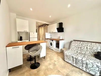 Cuisine ou kitchenette dans l'établissement Studio proche mer