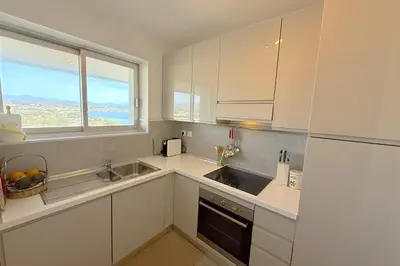 Cuisine ou kitchenette dans l'établissement 06DJ - Apartment with sea view for 4 people - terrace