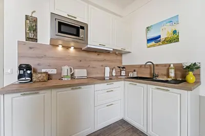 Cuisine ou kitchenette dans l'établissement L'Azur Antibois - Charme confort