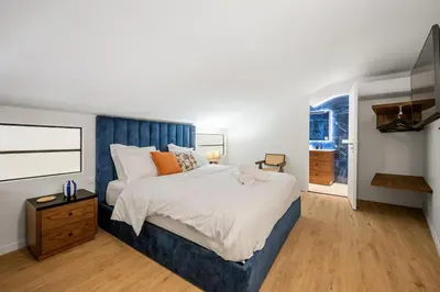Un ou plusieurs lits dans un hébergement de l'établissement Duplex Suite Old Town