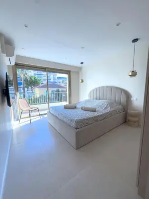 Un ou plusieurs lits dans un hébergement de l'établissement 4-star suite close to Sea , Juan les Pins