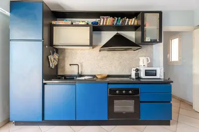 Cuisine ou kitchenette dans l'établissement Appartement élégant à Antibes - Welkeys
