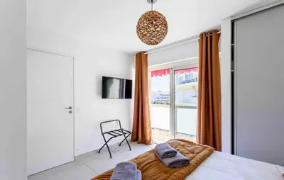 Un ou plusieurs lits dans un hébergement de l'établissement Cannes 2 bedrooms apartment & 2 bathrooms - 160A