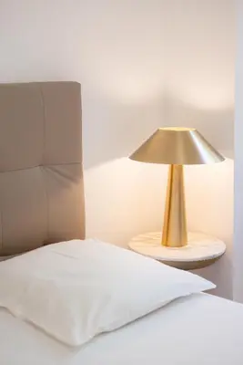 Un ou plusieurs lits dans un hébergement de l'établissement Rez-de-Jardin à Cannes Centre - Luxe & Design