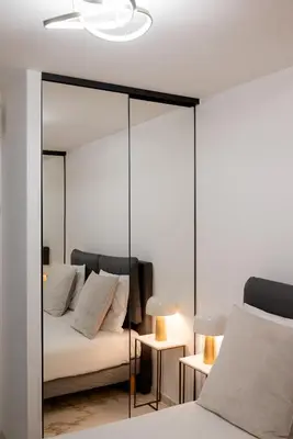 Un ou plusieurs lits dans un hébergement de l'établissement Rez-de-Jardin à Cannes Centre - Luxe & Design