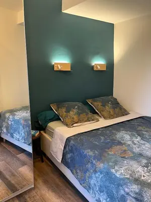 Un ou plusieurs lits dans un hébergement de l'établissement Duplex Remparts d'Antibes