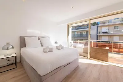 Un ou plusieurs lits dans un hébergement de l'établissement 3-Br Crossing Apartment Palm Beach