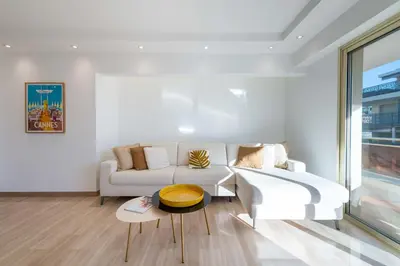 Coin salon dans l'établissement 3-Br Crossing Apartment Palm Beach