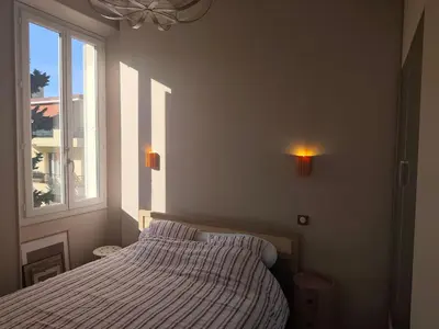 Un ou plusieurs lits dans un hébergement de l'établissement Cannes centre superbe 3 pièces moderne 10 min à pied du Palais des festivals et croisette
