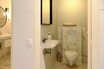 Salle de bains dans l'établissement Appartement de standing - quartier Martinez - 70m2