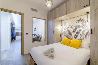 Un ou plusieurs lits dans un hébergement de l'établissement FOCH GRAND - Appartement Antibes 6P
