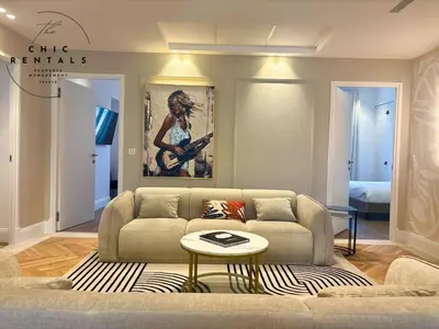 Coin salon dans l'établissement SCARLETT 4 Bedroom next to the Croisette
