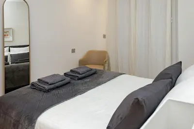 Un ou plusieurs lits dans un hébergement de l'établissement Palais Riviera
