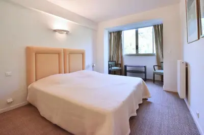 Un ou plusieurs lits dans un hébergement de l'établissement Résidence 3p Proche Centre Ville, Piscine Et Vue Mer - 3P proche centre ville, piscine et vue mer MAE-1673