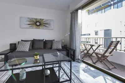 Coin salon dans l'établissement Résidence Cannes Palm Beach, 2 Min Des Plages - Cannes Palm beach, 2 min des plages MAE-1813