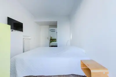 Un ou plusieurs lits dans un hébergement de l'établissement Résidence 90m2 Sur La Croisette Avec Terrasse & Vue Mer - 90m2 sur la Croisette avec terrasse & vue mer MAE-1963
