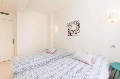Un ou plusieurs lits dans un hébergement de l'établissement Résidence 3p Moderne Et Cosy Aux Pieds De La Croisette ! - 3P moderne et cosy aux pieds de la Croisette ! MAE-2003