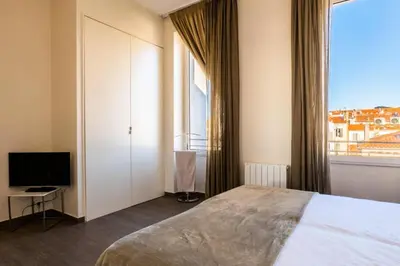 Un ou plusieurs lits dans un hébergement de l'établissement Résidence 3 Pièces Rue D’antibes à Deux Pas Du Palais Des Festivals - 3 pièces rue d’Antibes à deux pas du Palais des festivals MAE-2263