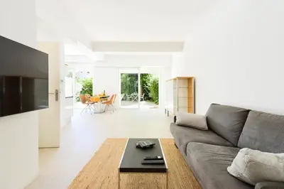 Coin salon dans l'établissement Résidence Rez-de-jardin, Plages à Pied Et Garage - Rez-de-jardin, plages à pied et garage MAE-2723