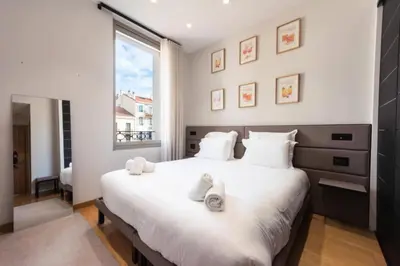 Un ou plusieurs lits dans un hébergement de l'établissement Résidence Duplex 145m² Terrasse Et Ascenseur Privé - DUPLEX 145m² Terrasse et Ascenseur Privé MAE-2873