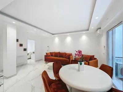 Coin salon dans l'établissement Executive 2BR Apartment near Croisette Ideal for MIPIM Terrace & Wi-Fi