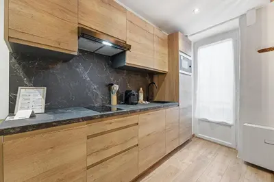 Cuisine ou kitchenette dans l'établissement Lou Cairou - 600m de la Plage