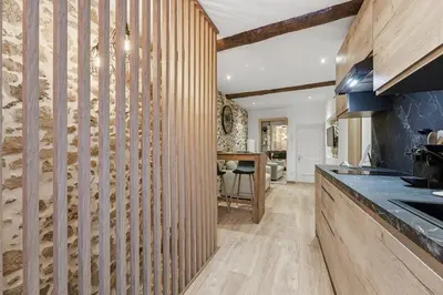 Cuisine ou kitchenette dans l'établissement Lou Cairou - 600m de la Plage