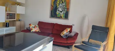 Coin salon dans l'établissement Magnifique deux pièces Lacour