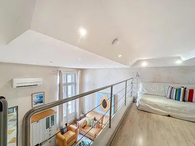 Un ou plusieurs lits dans un hébergement de l'établissement Cosy Short-Term Rental in Cannes