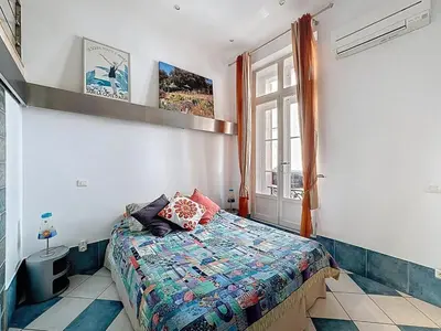 Un ou plusieurs lits dans un hébergement de l'établissement Cosy Short-Term Rental in Cannes