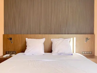 Un ou plusieurs lits dans un hébergement de l'établissement Croisette Luxury