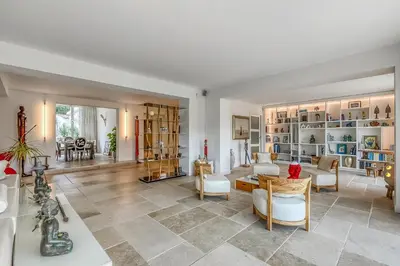 Coin salon dans l'établissement La Maison Blanche Sur Le Golf