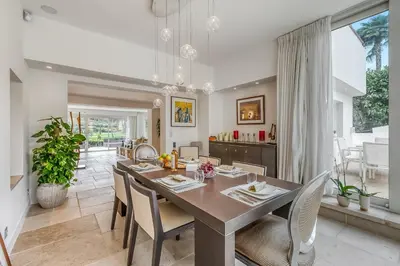 Coin salon dans l'établissement La Maison Blanche Sur Le Golf