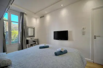 Un ou plusieurs lits dans un hébergement de l'établissement Clod - 2 bedrooms - Parking - Wifi Air conditioning