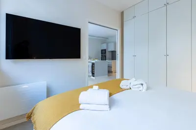 Un ou plusieurs lits dans un hébergement de l'établissement Modern 2 Chambres-TERRASSE-POINTE CROISTTE-PALM BEACH A2B267